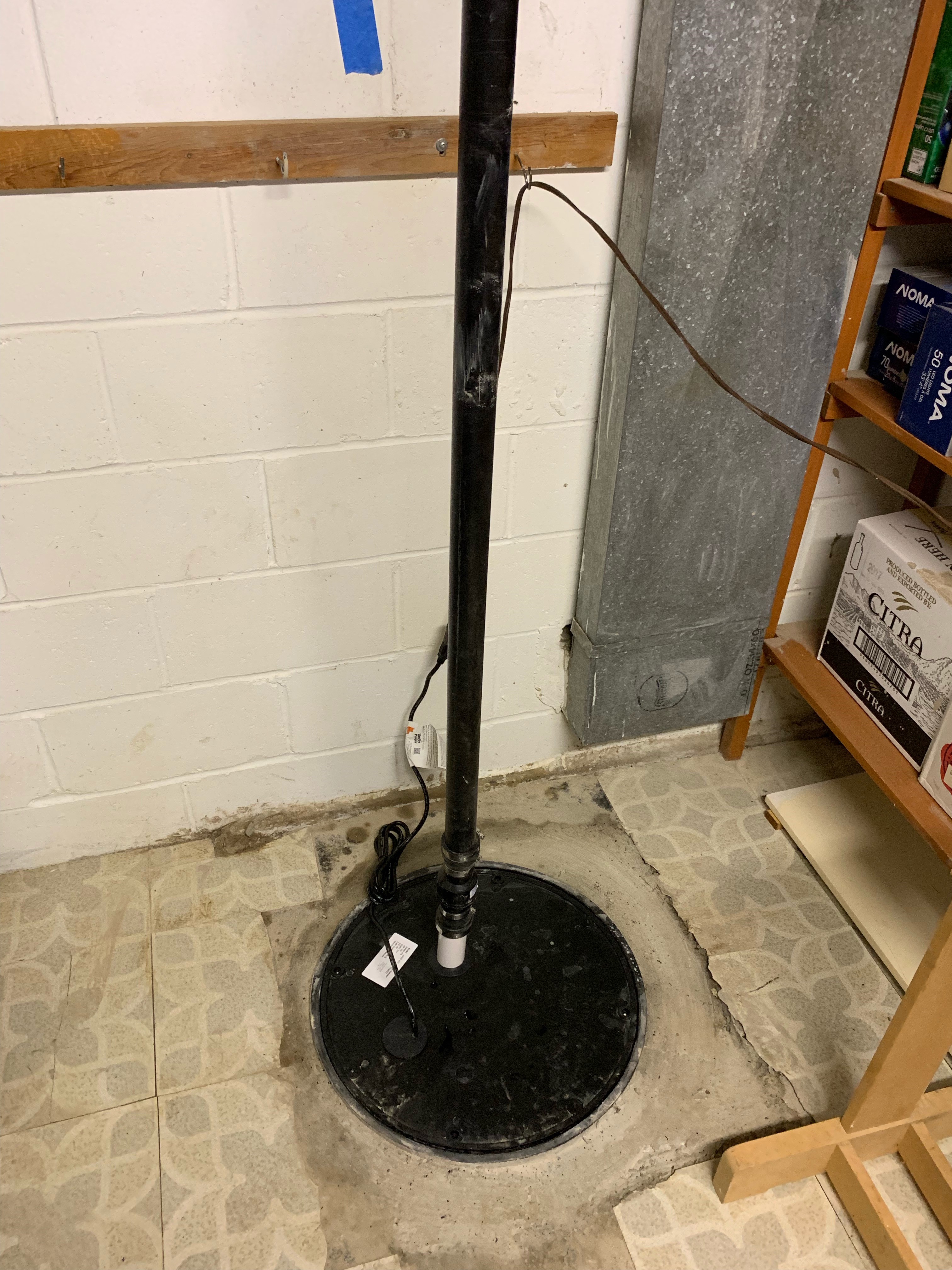 Sump pump installation in progress